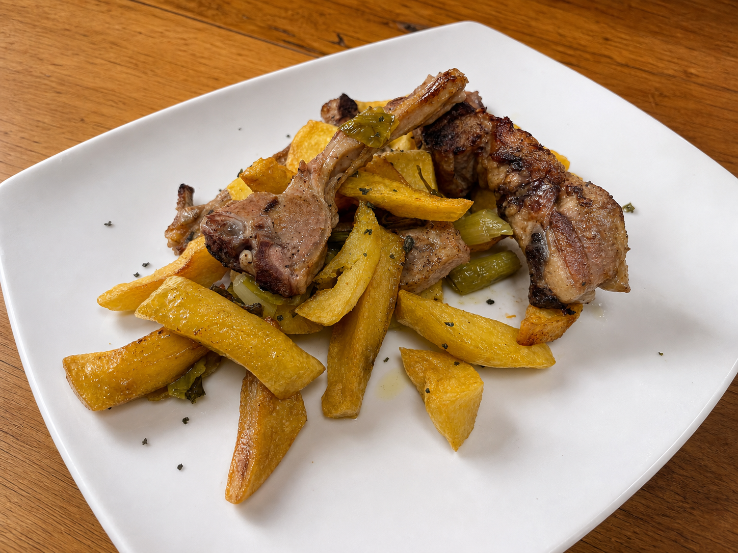 Chuletas de cordero con ajos tiernos